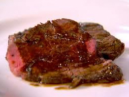 Carne de buey asada con salsa de curry y pera