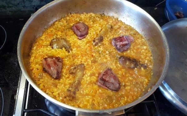 Elaboración de arroz con caza